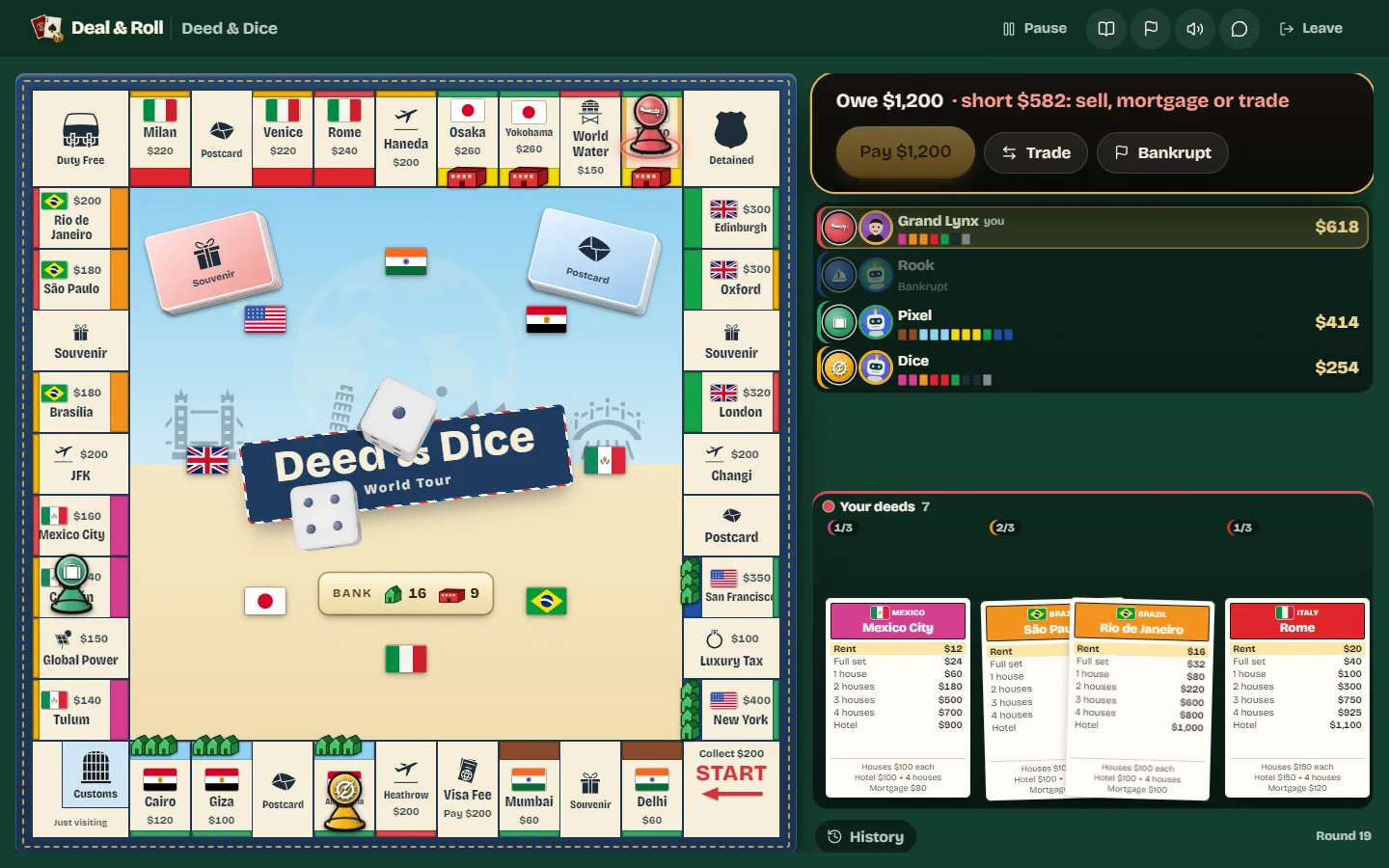 Houses built on a full colour set with players paying rent.